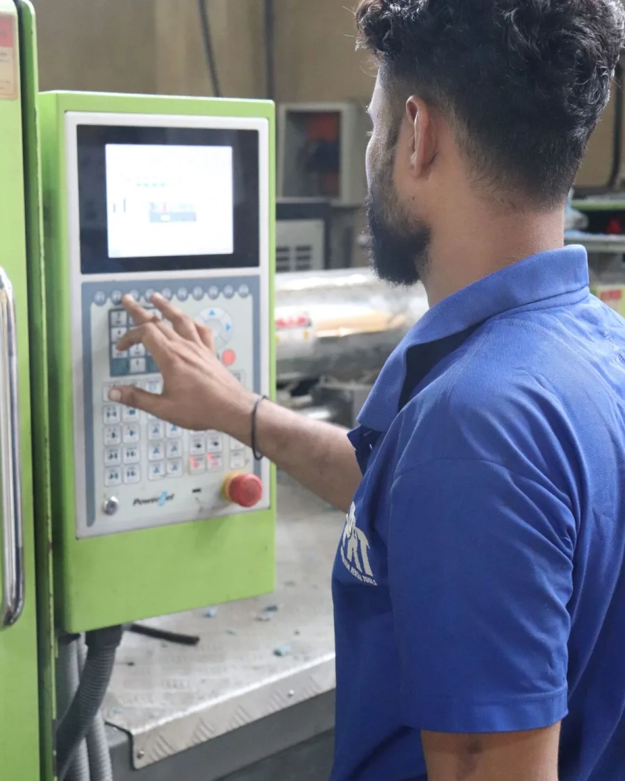 Operator at a moulding machine